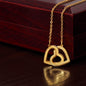 Interlocking Hearts Necklace Gift for daughter with 18K Yellow Gold Finish on display