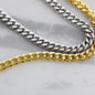 Polished Stainless Steel & 14K Yellow Gold Finish Cuban Link Chain Gift for Son from Mom on display