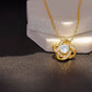 18K Yellow Gold Finish Love Knot Necklace on display